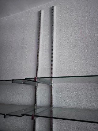 5 Estanterías expositores cristal y metal plateado