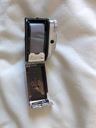 Cámara Hit miniatura espía antigua con funda