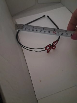 Diadema mariposa con pedrería roja