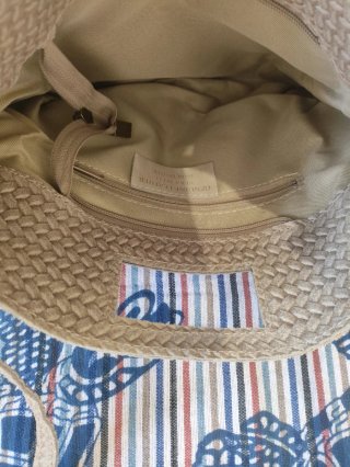 Bolso de mano tejido beige