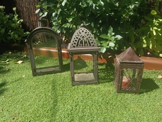 Faroles decorativos de metal y cristal