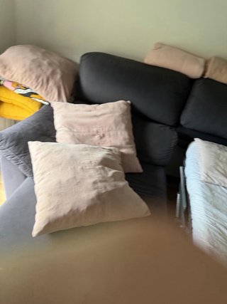 Sofá cama gris y negro