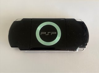 PSP-2004 + caricatore + UMD + scheda | senza batteria