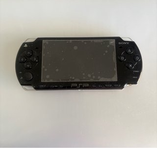 PSP-2004 + caricatore + UMD + scheda | senza batteria