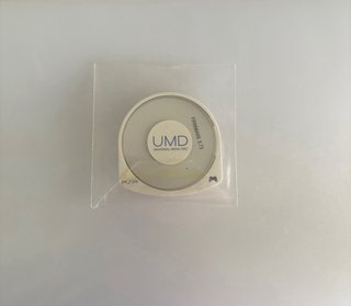 PSP-2004 + caricatore + UMD + scheda | senza batteria