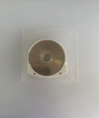 PSP-2004 + caricatore + UMD + scheda | senza batteria