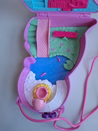 Polly Pocket Mamma Canguro con Bambino