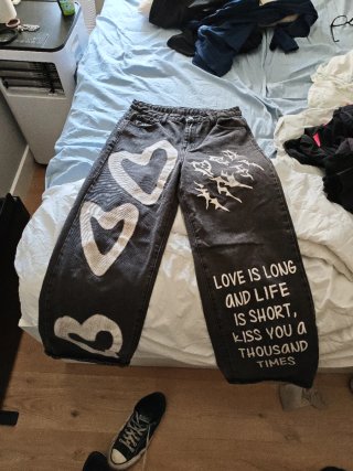 Pantalones vaqueros anchos con diseño