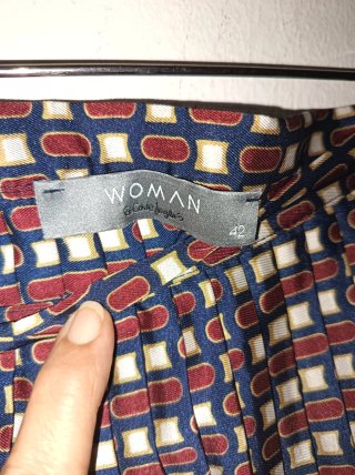 Falda plisada estampada mujer