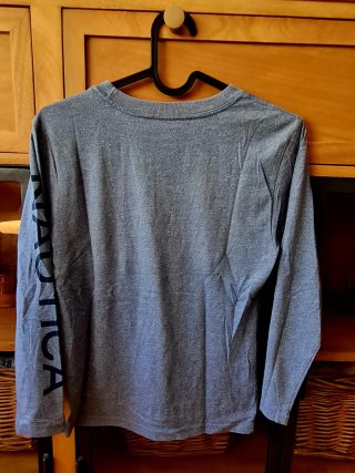 2 Camisetas Nautica 7 años aprox.