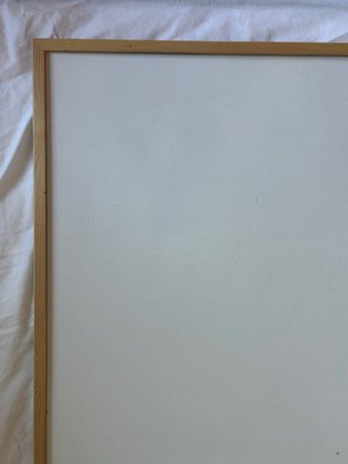 Pizarra blanca con marco de madera