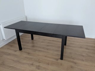 Mesa de comedor extensible negra 140/220 - IKEA