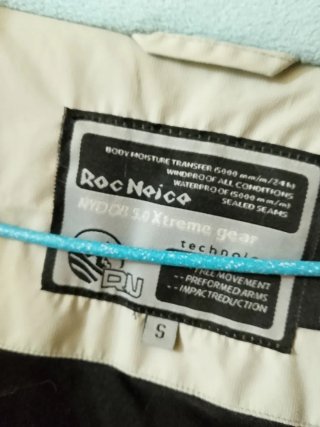 Cazadora polar azul y beige