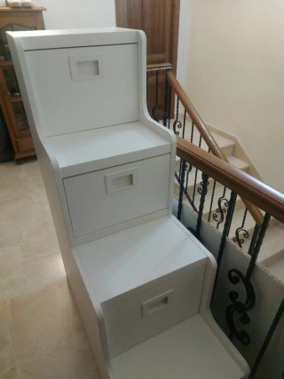 Cama alta con escalera y cajones
