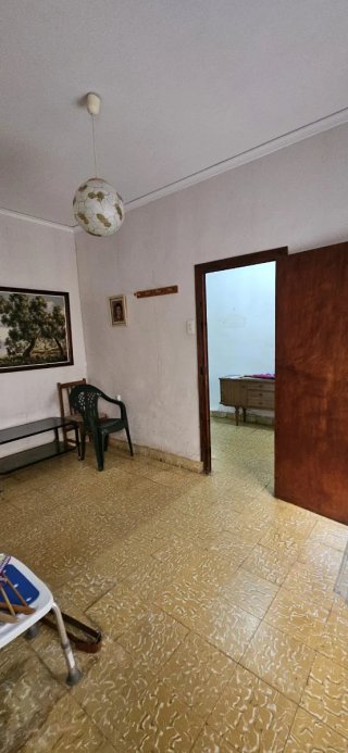 Casa tradicional de dos plantas.
