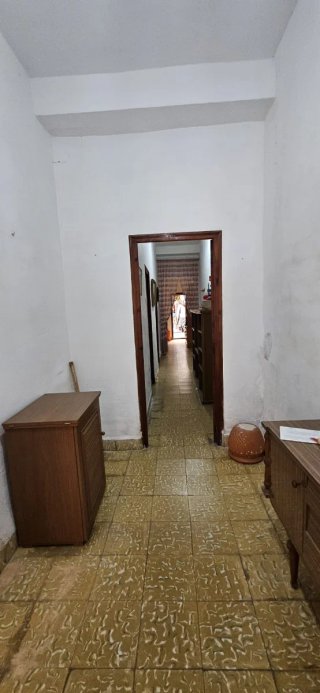 Casa tradicional de dos plantas.