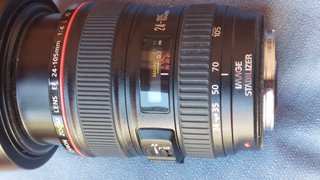 Cámara Canon con ópticas y accesorios