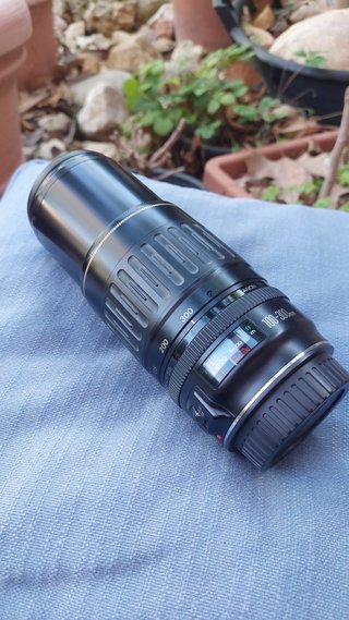Cámara Canon con ópticas y accesorios