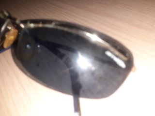 Gafas de sol Arnette grises y plateadas