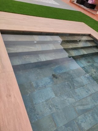 Piscina de obra piedra y madera