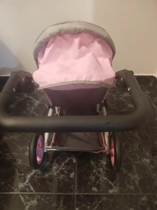 Carrito de bebé gris y rosa
