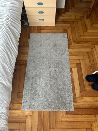 Alfombra gris de tela