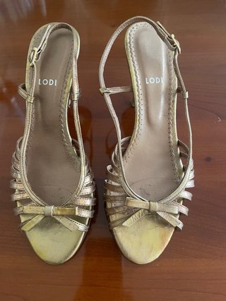 Sandalias Lodi doradas con lazo