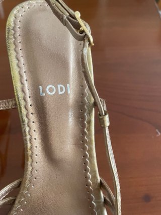 Sandalias Lodi doradas con lazo