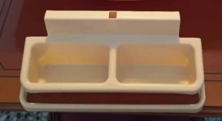 ** Organizador beige para colgar en mueble bebé