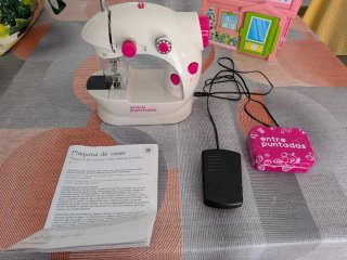 Máquina de coser Entre Puntadas