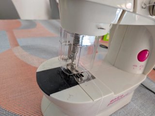 Máquina de coser Entre Puntadas