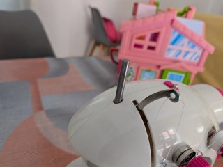 Máquina de coser Entre Puntadas