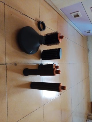 Dyson Airwrap con todos los accesorios
