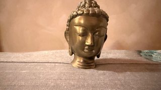 Testa di Buddha stilizzata