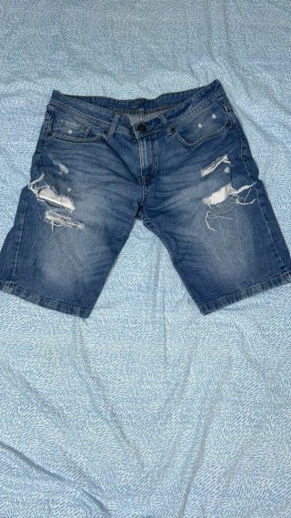 Jeans shorts uomo strappati