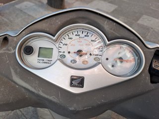 Honda Dylan 125 gris plata
