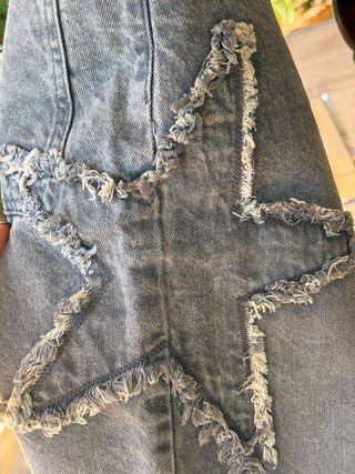Gli pantaloni grigi con stelle per bambini