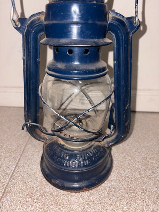 Lámpara de aceite azul y transparente