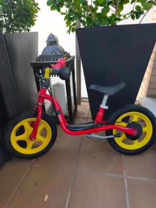 Bici sin pedales Puky roja y amarilla
