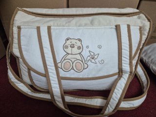 Bolso y cambiador bebe. Oso y molinillo