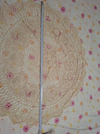 Tapete de ganchillo beige hecho a mano
