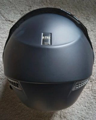 Casco de moto negro abatible