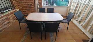 Mesa mosaico y 6 sillas ratán exterior