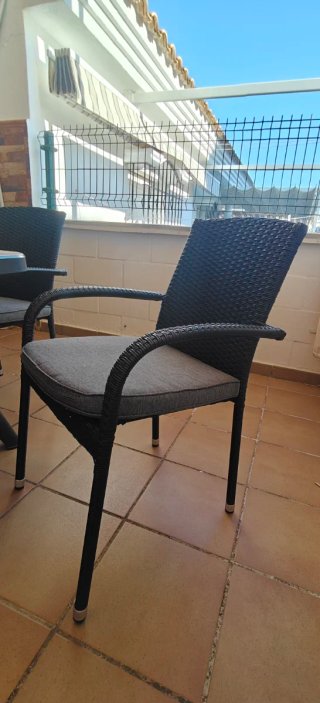 Mesa mosaico y 6 sillas ratán exterior