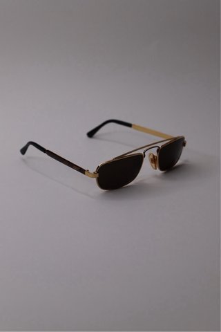 Gafas de sol vintage doradas de marca italiana
