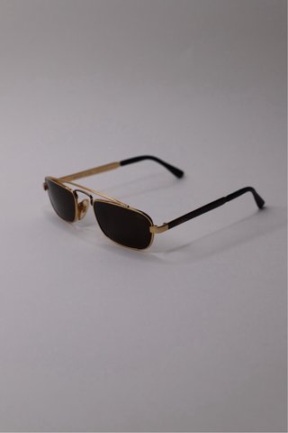 Gafas de sol vintage doradas de marca italiana