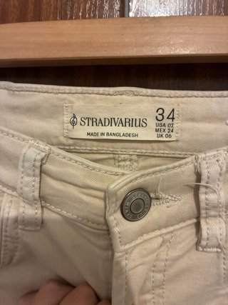 Pantalones campana beige talla XS