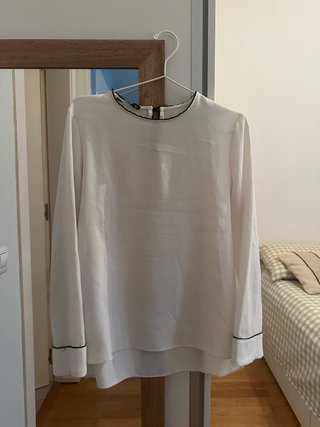 Blusa blanca elegante de Zara