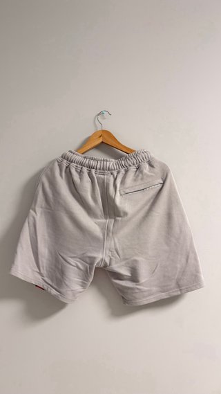 Chandal Syna World Gris y Rosa