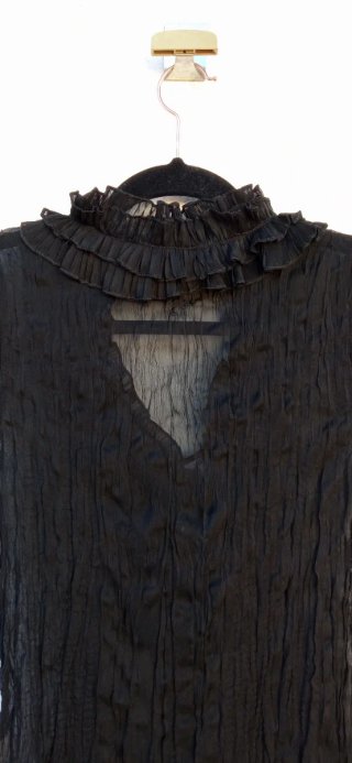 Blusa gasa negra con volantes